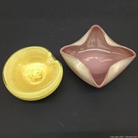Top view of square pink and white aventurine Murano glass bowl and round yellow aventurine Murano glass bowl with gold leaf accents.