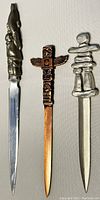 Full view of three Indigenous art inspired letter openers showing diversity in design and blade type