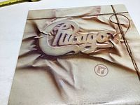 Front cover of Chicago 17 vinyl record showing embossed band name on a package design.
