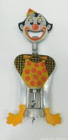 Front view of the Carlo Gemelli clown corkscrew showing full figure with polka-dot painted outfit and metal body.