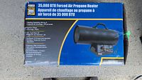 Box front of Power Fist 35000 BTU forced air propane heater showing key features and specifications.