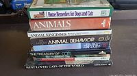 Photo showing stack of animal books from side angle, titles visible
