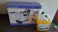 Photo of Bravetti deep fryer box showing the product with removable basket and control dial.