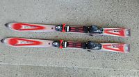 Top view of full pair of Carve 8.5 skis with bindings mounted, showing the length and overall condition.