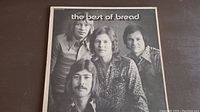 Front cover photo of 'The Best Of Bread' vinyl record album showing band members.