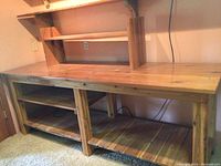 Full view of pine workbench with lower and upper shelf assembled