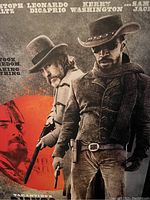Close-up photo showing upper torso and faces of characters on the Django movie poster, highlighting language and design details.