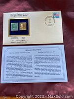 Presentation card showing both the 22KT gold replica and the original 1938 Millard Fillmore stamp with the first day of issue Washington DC postmark dated September 22, 1989.