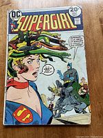 Front cover showing Supergirl with snakes on her head and Batman nearby, priced 20 cents, dated November 1973.