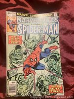 Front cover of Marvel Tales Starring Spider-Man #117 comic book showing Spider-Man and multiple characters with a tagline 'And one must fall!'