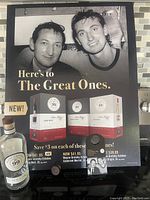 Full view of large hard cardboard window display with photo of Wayne Gretzky and Walter Gretzky, marketing text and prices for Wayne Gretzky Estates wines.