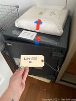 Front view of safe with foam-wrapped shelves on top