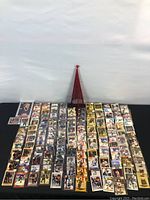 Full lot overview on black cloth with all cards arranged in rows and columns