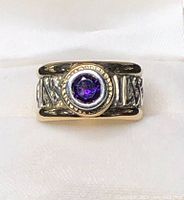 Front view showing amethyst gemstone and bezel