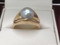 Angled front view showing entire ring in jewelry box