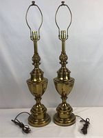 Pair of brass Stiffel torch urn lamps, front view