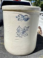 Full view of the 20 gallon stoneware crock showing the Western Stoneware logo and blue '20' marking.