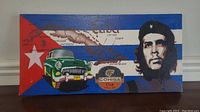 Frontal view of the canvas showing Che Guevara portrait, classic car, Cuban flag, and Cohiba logo