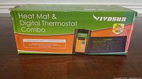 Box of VIVOSUN Heat Mat & Digital Thermostat Combo with branding and product details visible.