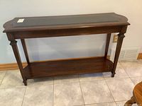 Full frontal image of the rectangular sofa hall table showing lower shelf, legs, and wooden frame.