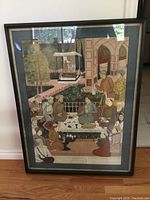 Full view of framed hand painted silk showing detailed group scene with traditional figures and architecture.