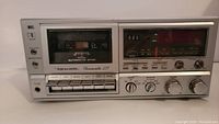 Front view of Realistic Chronosette 237 showing cassette compartment, AM/FM tuner, and control buttons