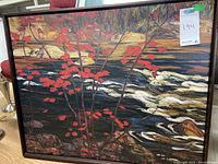 Full view of the painting showing the tree branch, water, rocks, and frame