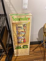 Box of Spacemaker heavy duty steel shelving showing label and shelving image
