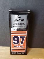 Front of the Tim Hortons box displaying NHL Superstar collectable stick with number 97 McDavid label.