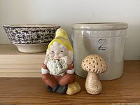 All items displayed together on wooden surface against beige wall.