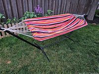 Assembled hammock on stand in backyard