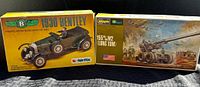 Both model kit boxes side by side: 1930 Bentley by Airfix and 1:35 M2 Long Tom by Dragon.