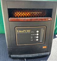 Front view of EdenPURE quartz infrared portable heater showing control buttons and LED indicator lights.