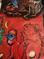 Cover art of the book showing a colorful surreal painting with stylized animal and human forms, signed by Chagall.