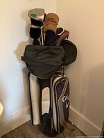 Full view of Callaway bag with clubs standing against wall