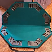 Poker and blackjack gaming table top with green padded playing surface, arranged chip and card holders, octagonal shape.