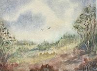 Close-up of original watercolour painting showing landscape scene with trees, hills, two birds in the sky, and artist's signature lower right corner.