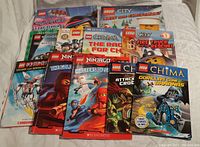 Photo of all eleven assorted LEGO kids books showing covers of Ninjago, Chima, LEGO City, LEGO Movie, and Mixels books.
