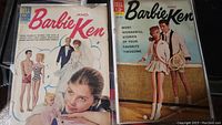 Two comic book front covers side by side in plastic sleeves