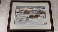 Full view of framed signed art print showing winter rural scene with horse-drawn sleigh and farmhouse.