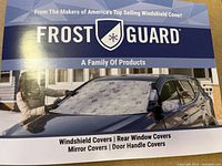 Photo of Frost Guard branding and product types including windshield covers, rear window covers, mirror covers, and door handle covers shown on car.