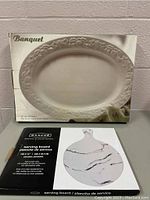 Boxed Banquet porcelain serving platter with embossed grapevine design