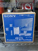 Box front showing Sony DAV-C770 Compact AV System branding and product image.