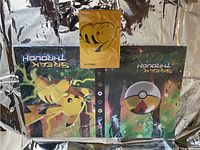 Photo of Pokémon storage binder with Pikachu image and binder includes sleeve pockets for cards.