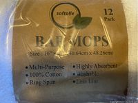 Close-up photo of the packaging label showing brand Softolle, product name Bar Mops, 12 pack, size 16"x19", 100% cotton, ring spun, multi-purpose and other features.