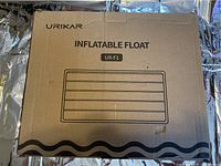 Box front showing brand Urikar and model UR-F1 for inflatable float.