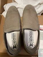 Pair of new men's Mephisto shoes in beige/tan perforated leather with slip-on style, inside shows Air-Relax branding, size US 12.