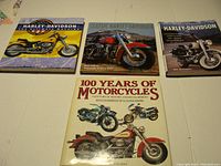 Front covers of three Harley-Davidson motorcycle coffee table books showing different classic Harley-Davidson motorcycle images and titles.