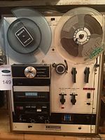 Full view of Akai X-2000SD tape deck with Grundig and Sony reels loaded.