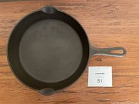 Top view of the Griswold No. 8 cast iron skillet showing smooth cooking surface and dual pouring spouts